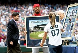 Cincinnati Reds Ken Griffey, Jr. warms up in right field in the