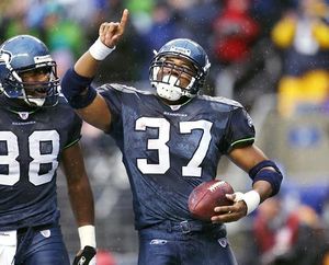 Seattle Seahawks running back Shaun Alexander (37) carries the