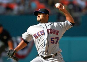 New York Mets pitcher Johan Santana (57) works in the first inning