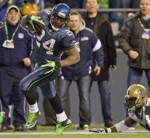 Marshawn Lynch shakes tacklers, then hands for Seahawks - The