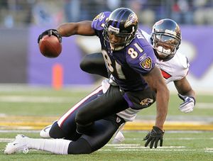 Safely in playoffs, Ravens have division to play for