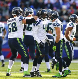 Miami Dolphins defensive back Byron Maxwell stands on the field before an  NFL football game against the Seattle Seahawks, Sunday, Sept. 11, 2016, in  Seattle. (AP Photo/Stephen Brashear Stock Photo - Alamy