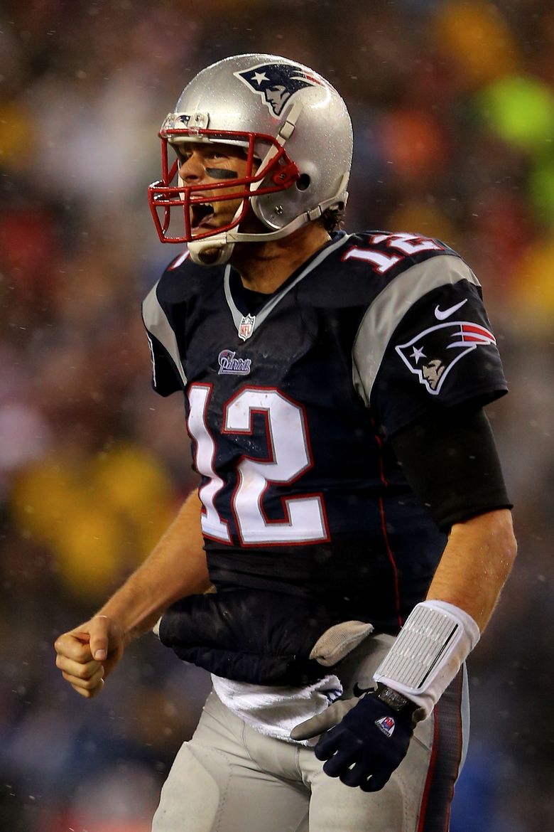 Quarterback Tom Brady of the New England Patriots looks on before News  Photo - Getty Images