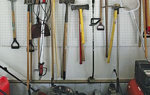 Large garden tools have a place to hang in the newly organized garage of Mickey and Angie Remon, as pictured September 5, 2009, at their Richfield, Ohio home. (Phil Masturzo/Akron Beacon Journal/MCT)