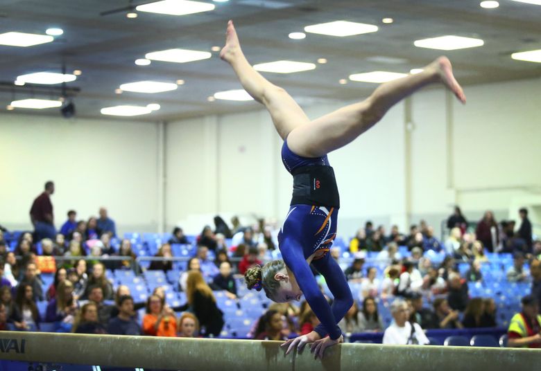 Kayla Porter of Auburn Mountainview performs her beam routine during the 3A/2A 2015 State Gymnastics championships at the Tacoma Dome on Friday, Feb. 20, 2015. Porter finished first in the beam competition with a score of 9.450. The championships continue on Saturday.  (Lindsey Wasson / The Seattle Times)