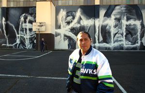 Seattle, Wa. February 23, 2015
Muralist Andrew Morrison filed a police report Monday for damage done over the weekend to his Native American murals on the side of the Wilson-Pacific school building. 
The white letters painted over the faces of Chief Joseph, Geronimo and Sitting Bull spelled out the word DAPKILO.