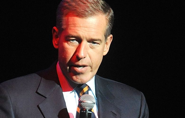 FILE – In this Nov. 5, 2014 file photo, Brian Williams speaks at the 8th Annual Stand Up For Heroes, presented by New York Comedy Festival and The Bob Woodruff Foundation in New York. Williams has admitted he spread a false story about being on a helicopter that came under enemy fire while he was reporting in Iraq in 2003. Williams said he was in a helicopter following other aircraft, one of which was hit by ground fire. His helicopter was not hit. NBC News was not commenting Thursday about whether its top on-air personality would face disciplinary action. (Photo by Brad Barket/Invision/AP, File)