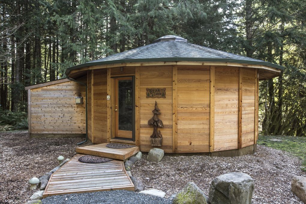 The Bear Cabin is the newest of the multi-sided, yurt-like cedar units for rent at Stormking Spa and Cabins. (Steve Ringman/The Seattle Times)
