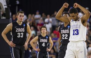 Duke’s Matt Jones celebrates the Blue Devils’ 66-52 win over Gonzaga in the South Regiional, advancing them to the Final Four.  Duke and Gonzaga play in NCAA South Regional final Sunday, March 29, 2015, in Houston, TX.