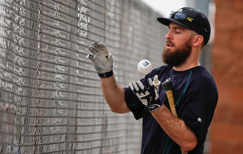 Seattle Mariners' Dustin Ackley connects with a pitch for a double