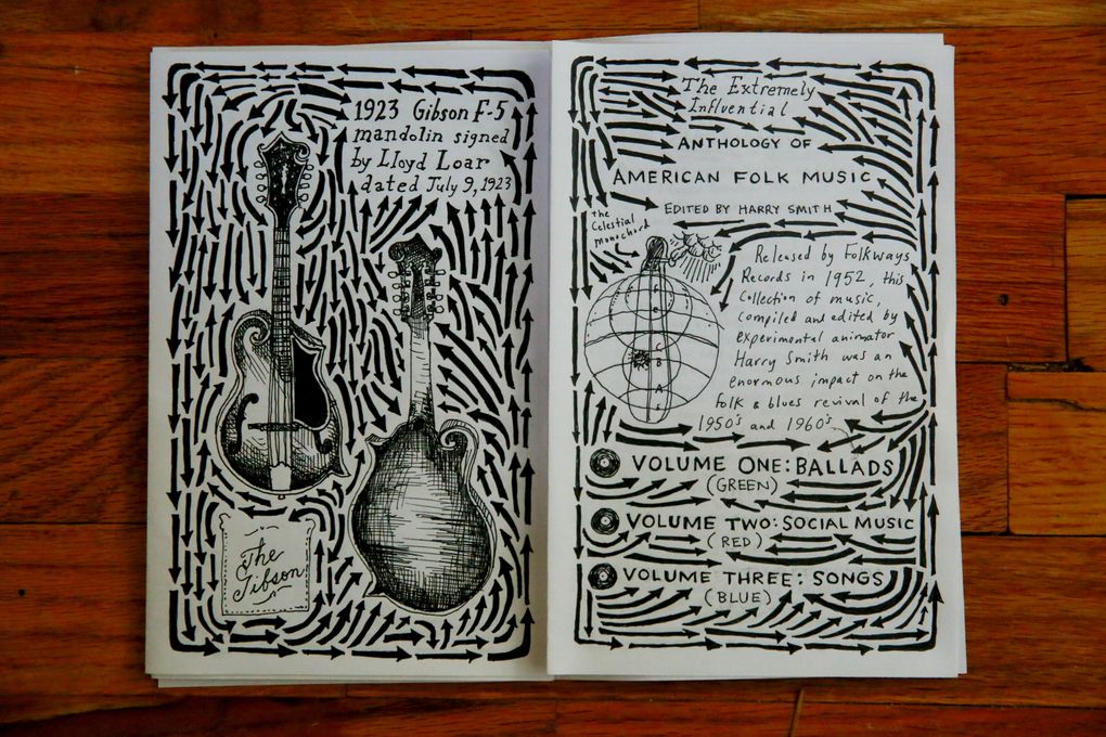 Drew Christie, an animator and illustrator, created an illustrated encyclopedia of folk instruments. The hand-drawn book of more than 100 pages was created over six years. (Erika Schultz / The Seattle Times)