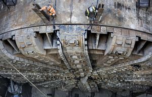 BERTHA’S BREAKTHROUGH – SEATTLE – 030615
Workers stand on top of the tunnel-boring machine Bertha, looking down at the ring-shaped cutter drive and bearing that has been exposed to be lifted out and repaired.

A look and an interview from the edge of Bertha’s repair vault.