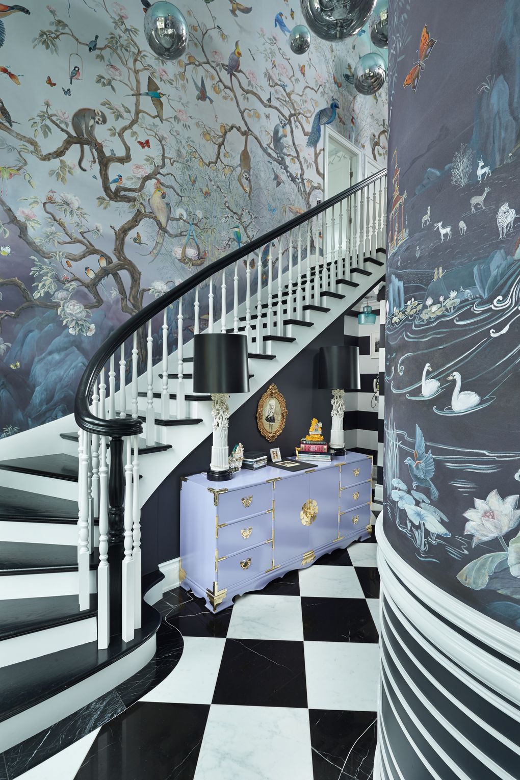 The grand entry is indeed that. Donna says she once owned the real Alice’s copy of “Alice’s Adventures in Wonderland,” which she bought from the Duke of Gloucester’s collection and then sold to pay for these murals painted by Seattle artist Jennifer Carrasco. (It took her a year.) The floor is marble; 17 Tom Dixon pendant lights hang overhead. (Benjamin Benschneider / The Seattle Times)