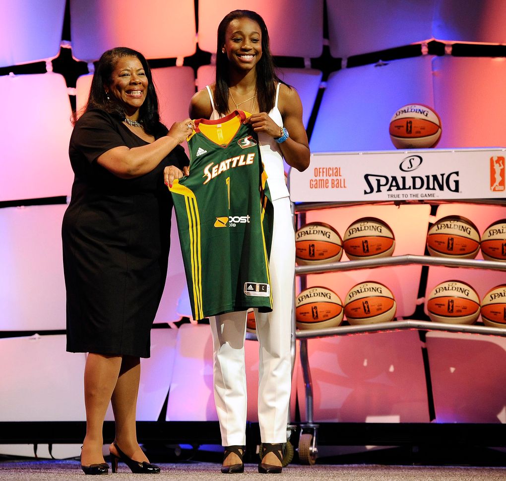 Loyd, right, with WNBA president Laurel J. Richie, became the third Storm player selected No. 1 overall on Thursday. (Jessica Hill/AP)