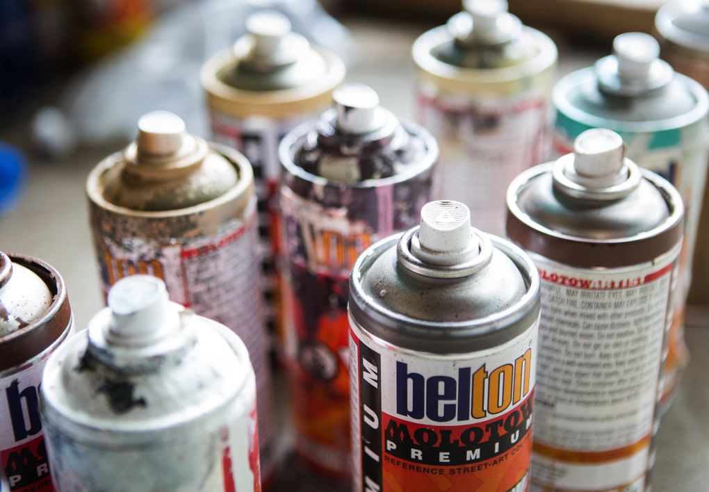 Nix often uses Belton Molotow spray paint for his artwork. (Lindsey Wasson/The Seattle Times)