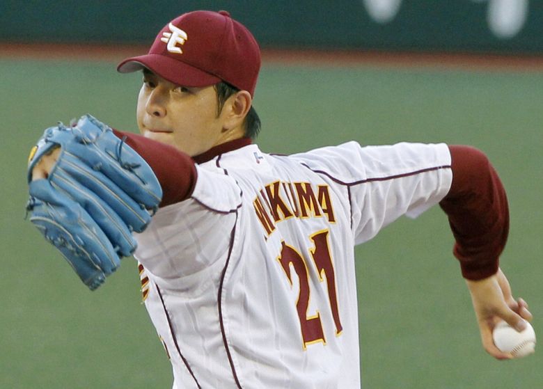Seattle Mariners pitcher Hisashi Iwakuma pitched for the Tohoku Rakuten Golden Eagles for seven seasons, Here, Iwakuma pitched in an Eagles game in 2010. (The Associated Press)