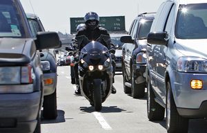California would be the first state to sanction lane-splitting — the traffic-evading tactic, already widespread on traffic-choked freeways of Los Angeles — if current legislation previals. (Lori Shepler/Los Angeles Times/TNS)