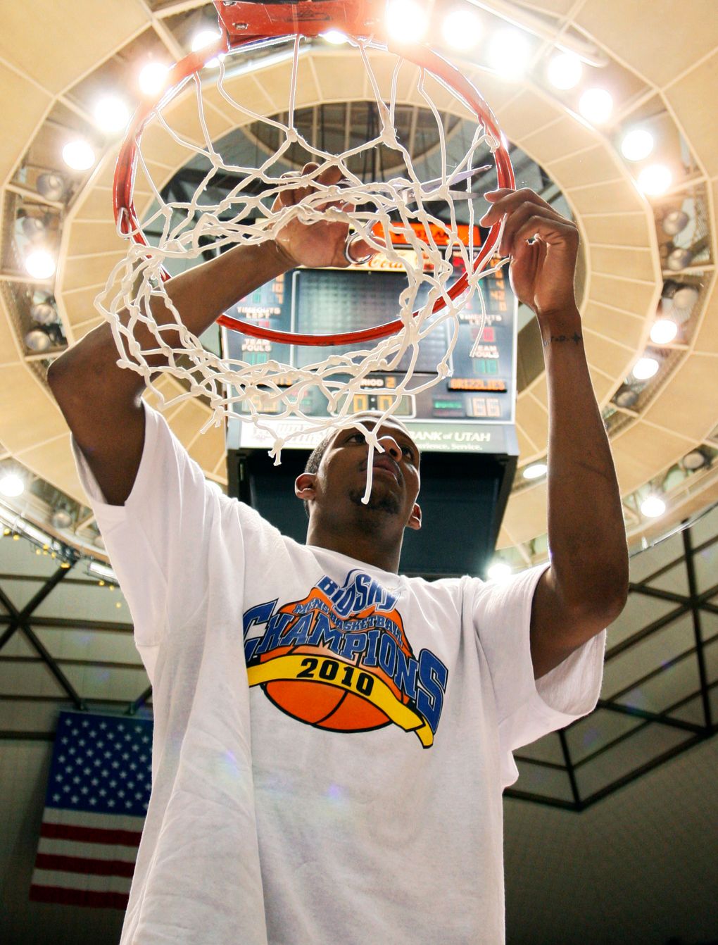 Montana’s Anthony Johnson cuts the net following Montana’s 66-65 win over Weber State in 2010 that sent the Grizzlies into the NCAA tournament. He scored his team’s final 21 points. (Colin E Braley/ASSOCIATED PRESS)