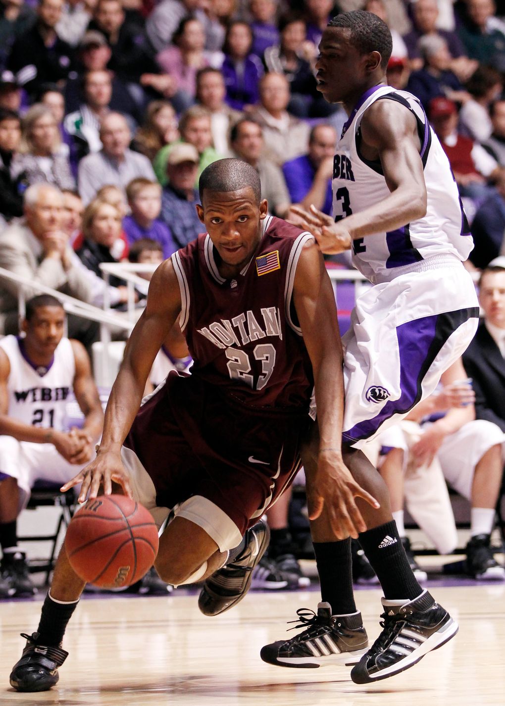 Montana’s Anthony Johnson (23) drives past Weber State’s Franklin Session (23) during the first half of their NCAA, Big Sky Conference championship basketball game, Wednesday, March 10, 2010 in Ogden, Utah. Johnson scored a tournament record, 42 points and was the tournament’s MVP in the Grizzlies 66-65 win. (Colin E Braley/ASSOCIATED PRESS)