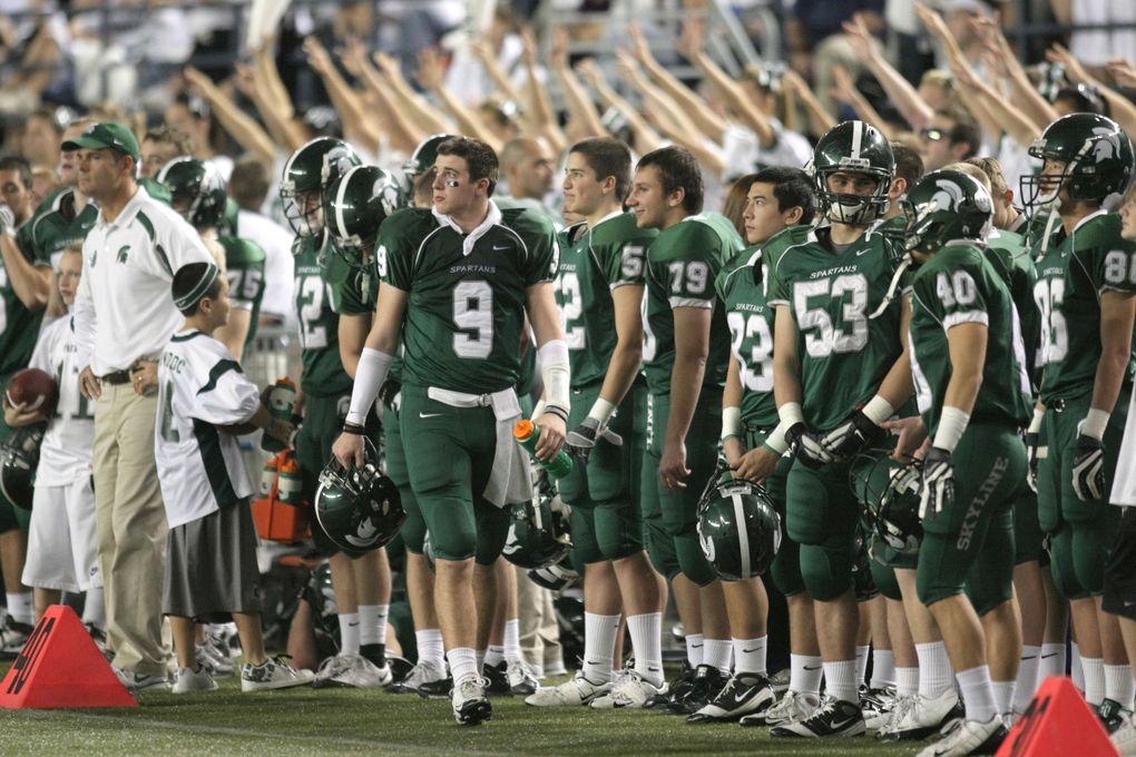 Jake Heaps patrols the side line as the Spartan defense attempts to slow dow the Saxon big play offense in the fourth quarter of the 4A State Title game at the Tacoma Dome on December 5, 2009. (Jim Bates / The Seattle Times)