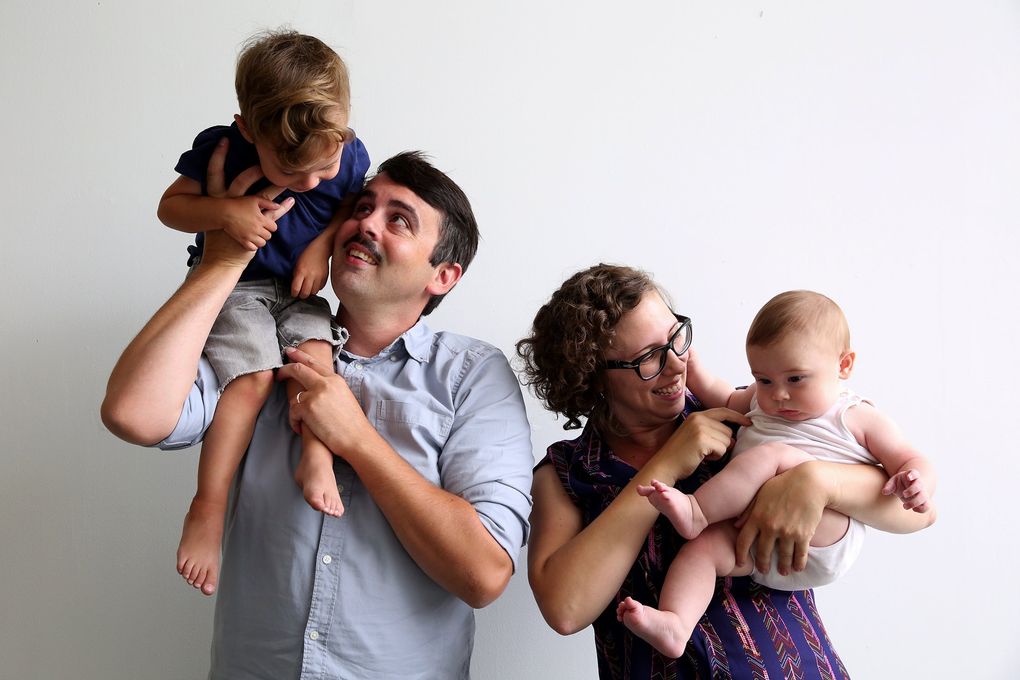 Parents Will Rounsavell and Hillary Rielly are photographed with their children Ansel Rounsavell, 2, and Harlan Rounsavell, 4 months, in South Lake Union. Over the years, naming children has become more complicated. (Erika Schultz / The Seattle Times)