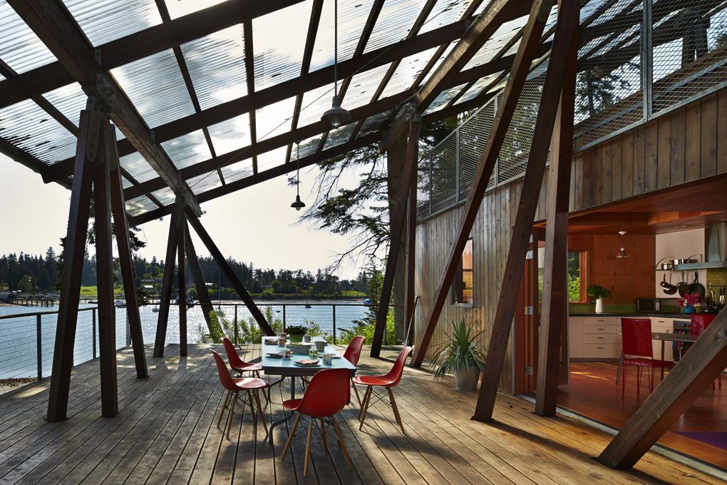 The polycarbonate deck cover encourages and filters light, great for dining. However, it’s not all oysters and drinks at sunset around here. Once, on a high tide, the canoe floated off to the other side of the island. Friendly neighbors fetched it and brought it home. (Benjamin Benschneider/The Seattle Times)