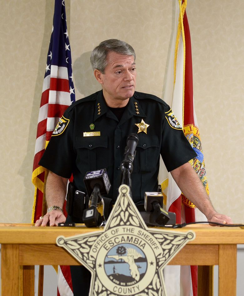 Escambia County Sheriff David Morgan speaks at a news conference in Pensacola, Fla., Tuesday, Aug. 4, 2015. Morgan said a triple homicide in Florida is being investigated as a possible ritualistic killing connected to the recent blue moon. (Ben Twingley, Pensacola News Journal via AP)