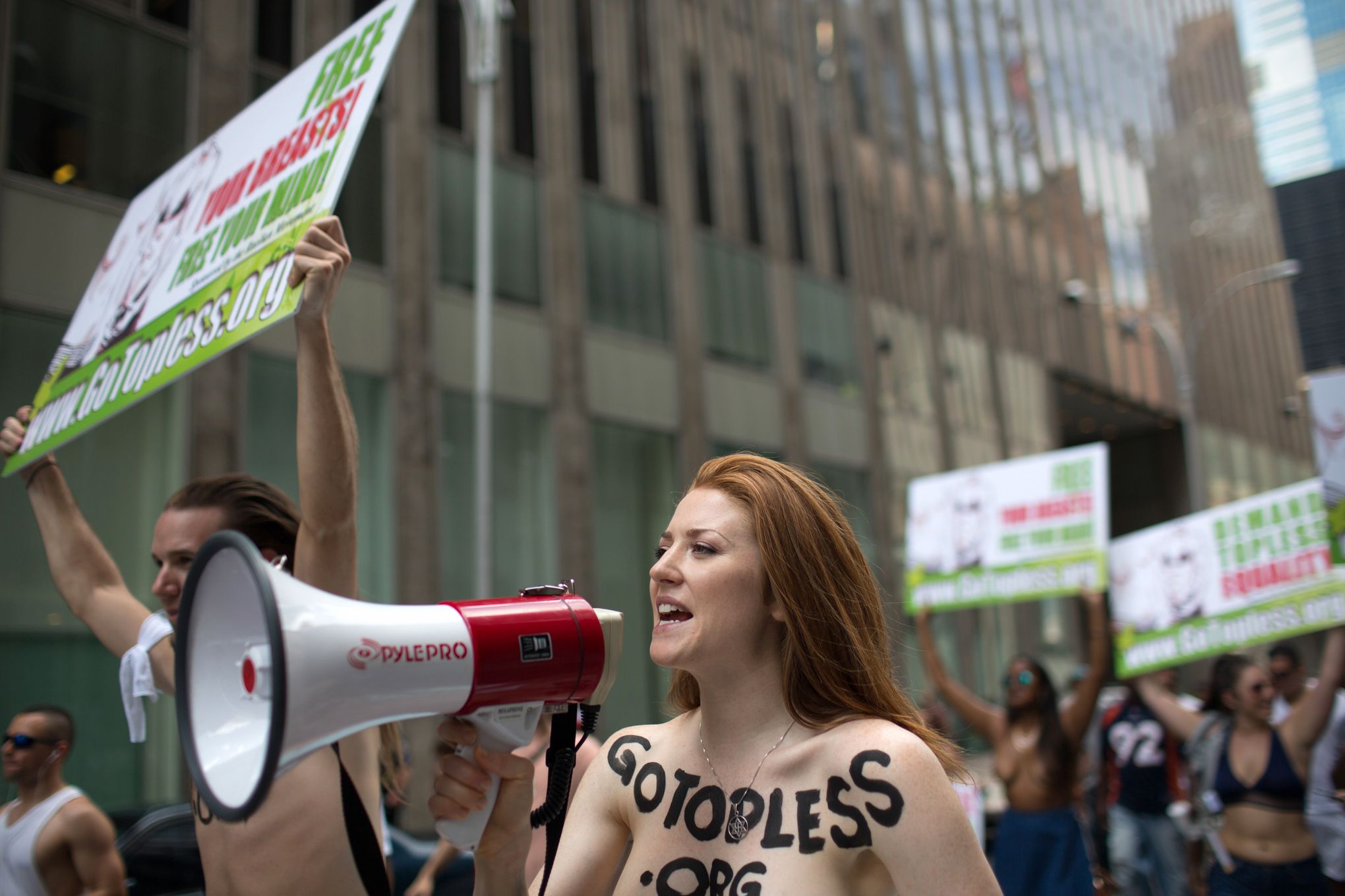 NY stages topless parade with 60 cities worldwide | The Seattle Times