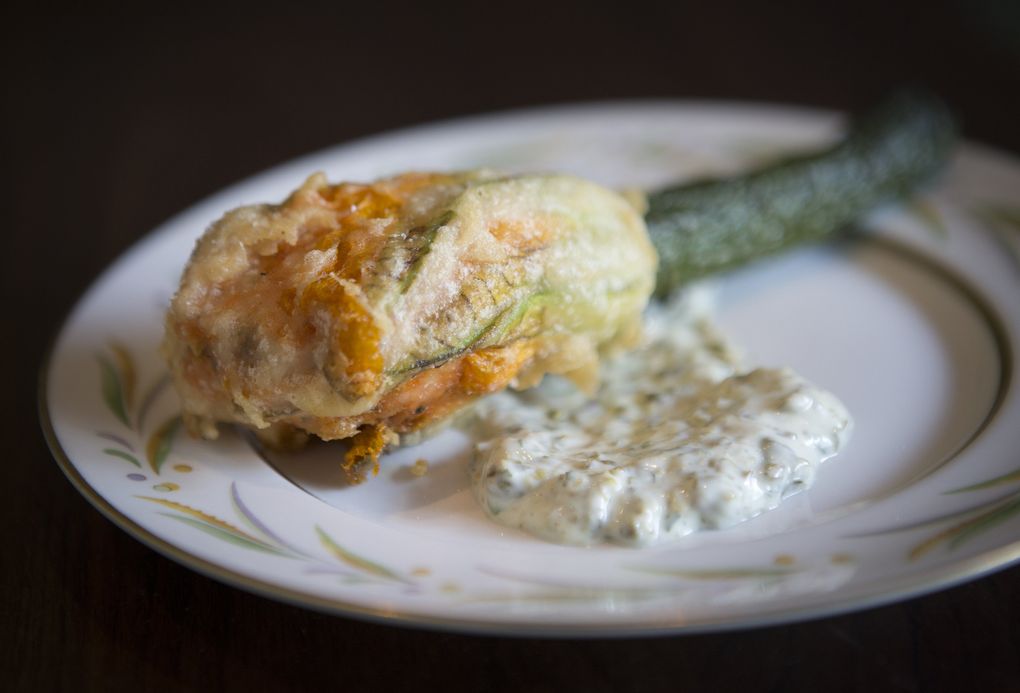 The fried squash blossom at Salare in Ravenna, a chef-driven neighborhood restaurant from Edouardo Jordan, who was chef de cuisine at Matt Dillon’s Bar Sajor. (Lindsey Wasson/The Seattle Times)