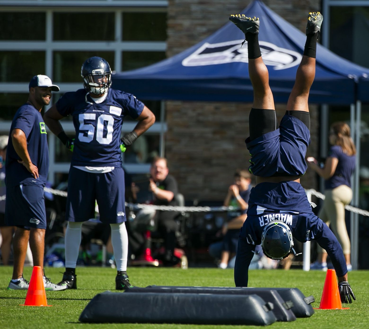 Seattle Seahawks - Kris Richard receives congratulations from Richard  Sherman after Richard coached his first victory and shutout since being  named defensive coordinator. Read more »