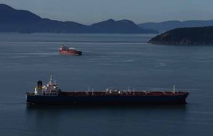 TANKER 031214The oil tankers Yang Ning Hu CQ, closet to camera and Eser K CQ are positioned in Samish Bay near the San Juan Islands.137034