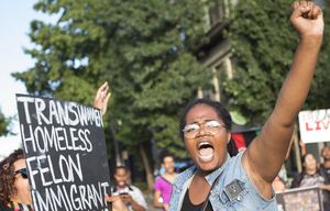 Yasmeen Johnson, originally from Lynchburg, Va., chants “Black lives matter” as she walks in the middle of the 12th Ave. and Pine St. intersection, blocked off by protesters, during a Black Lives Matter rally on Sunday, Aug. 9, 2015, the anniversary of the shooting of Michael Brown in Ferguson. On Saturday, a few Black Lives Matter activists halted a rally at Westlake Park in Seattle as Democratic presidential candidate Sen. Bernie Sanders was speaking to a crowd of thousands.