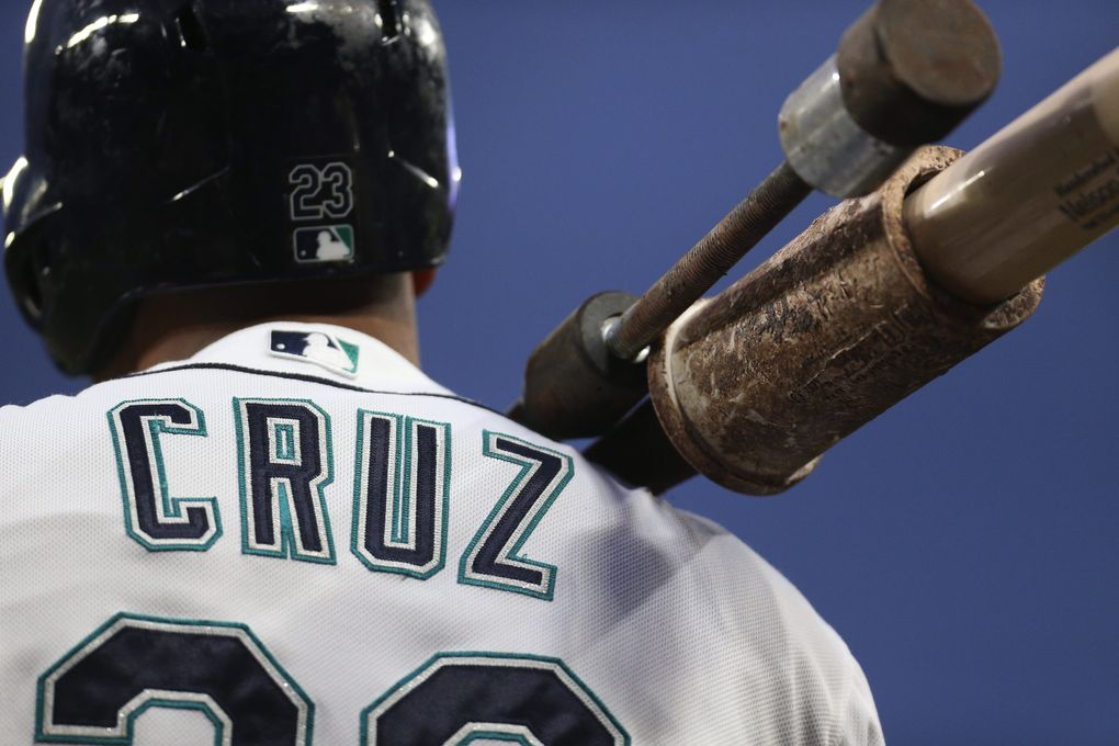 Mariners DH Nelson Cruz on deck in the first inning. (Ken Lambert / The Seattle Times)