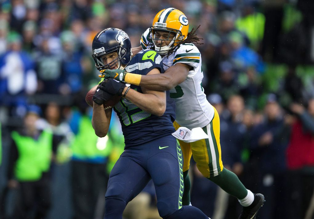 Seahawks wide receiver Jermaine Kearse makes game winning touchdown catch as Packers cornerback Tramon Williams can’t stop the score during overtime of NFC Championship game, Sunday, Jan. 18, 2015, at CenturyLink Field, in Seattle. (Mike Siegel / The Seattle Times)