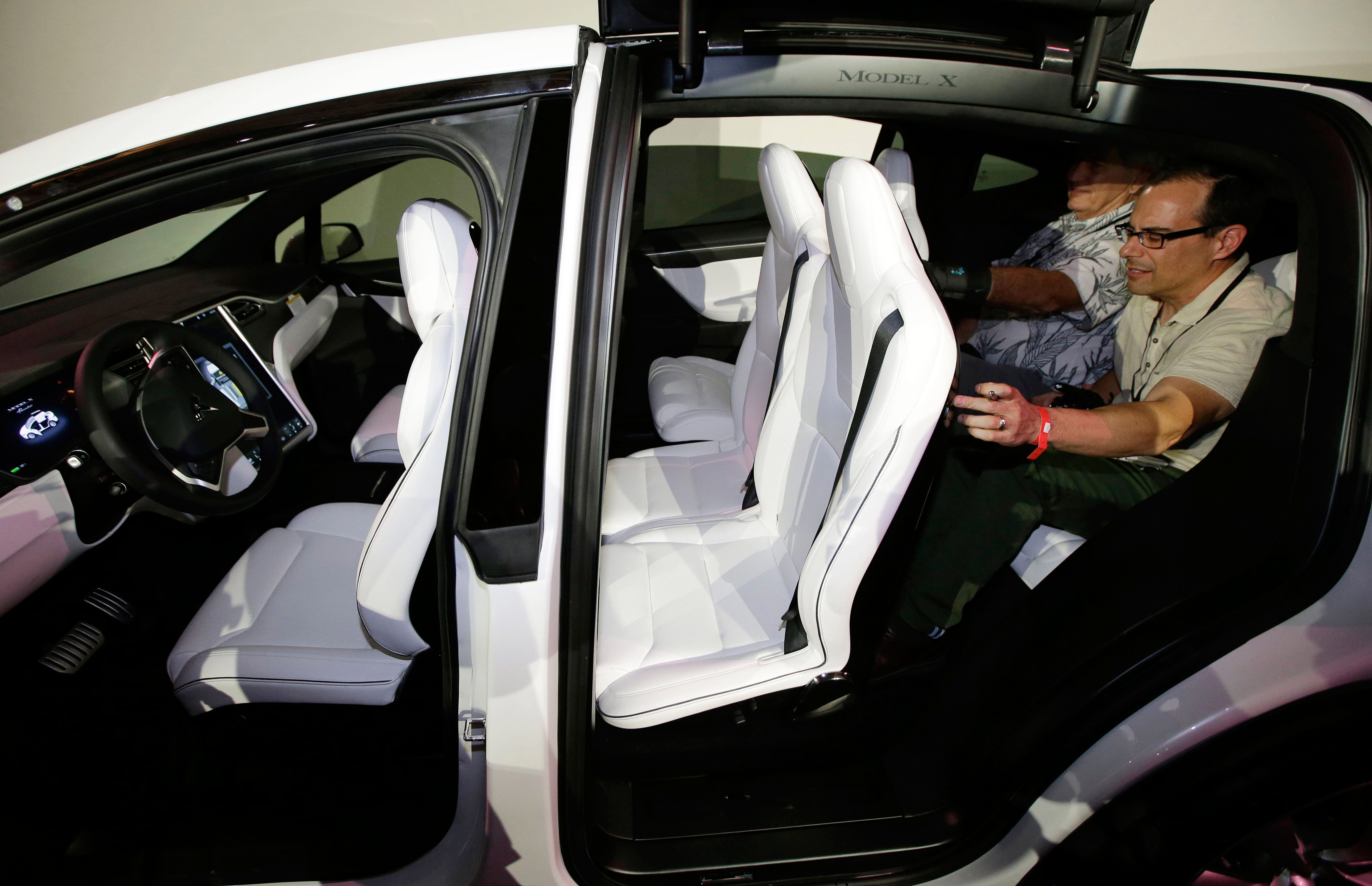 Tesla store suv doors