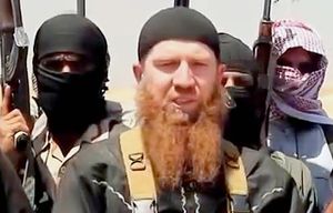 Abu Omar al Shishani, a former non-commissioned officer in the Georgia's special forces, addresses Islamic State fighters in a screen grab from a video posted on the Internet by the Islamic State. (Screenshot from Islamic State video/TNS)