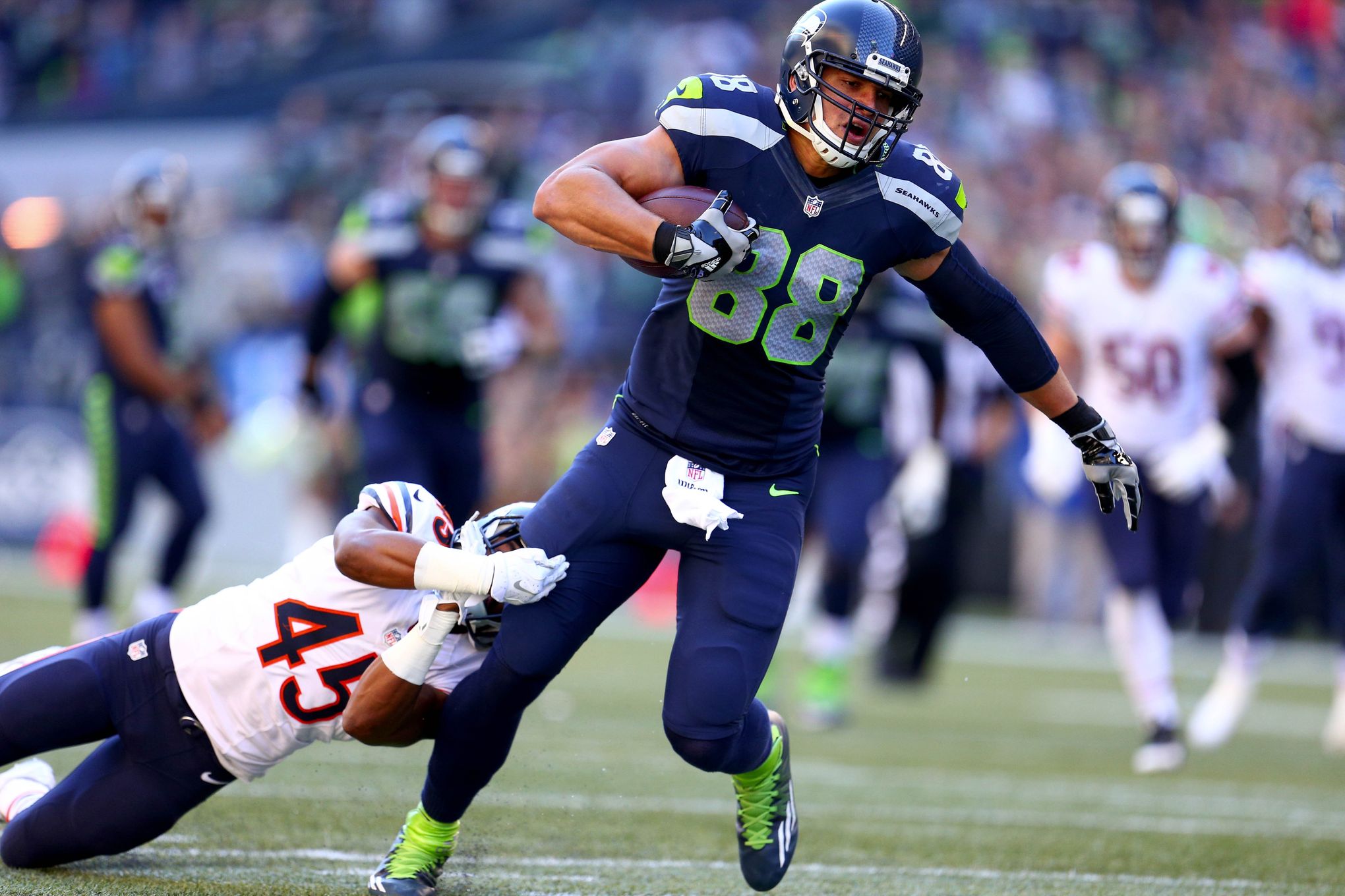 Seattle Seahawks tight end Jimmy Graham (88) brushes off a tackle by  Carolina Panthers outside linebacker A.J. Klein (56) at CenturyLink Field  in Seattle, Washington on December 4, 2016. Graham caught six