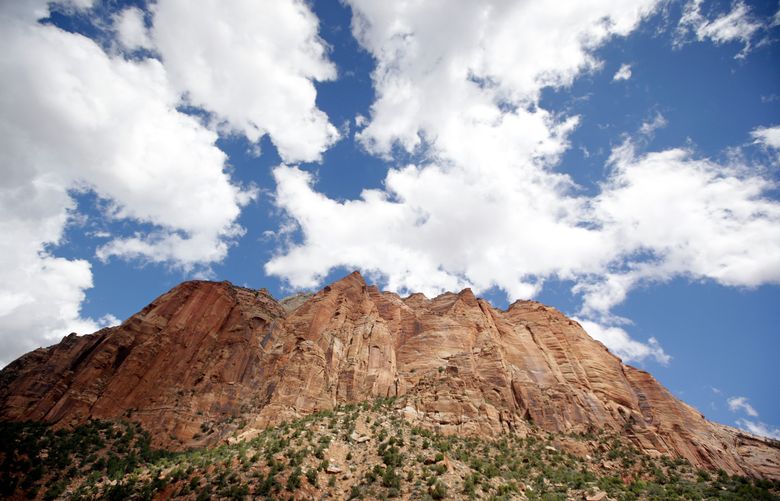 This Sept. 16, 2015 photo, shows Zion National Park, near Springdale, Utah.  Zion National Park officials are retracing what led up to the deaths of seven people in a flooded canyon on Sept. 15 before a panel assesses what can be done to keep a growing number of visitors safe when spectacular natural settings turn perilous. (AP Photo/Rick Bowmer)