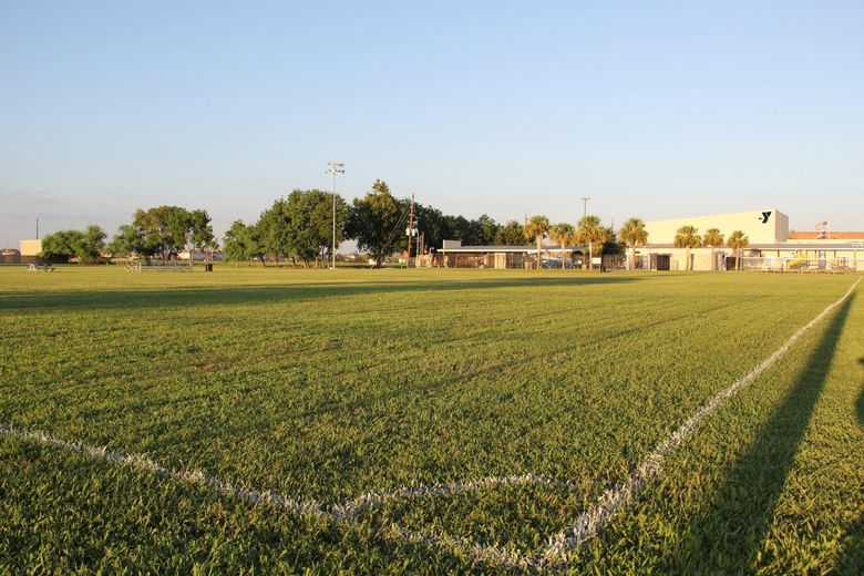 Russell Okung’s first football field at the Alief YMCA football field photography .