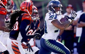 Rawls runs for 106 yards, 2 TDs in Seahawks 40-7 blowout of