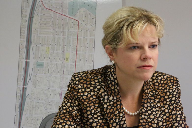 Elizabeth McCoury, CEO of the U District Partnership, has noticed “a big change” since the SPD and UW teamed up. She says any permanent improvement will require a change “the culture of the neighborhood.” (Ken Lambert / The Seattle Times)