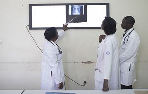 An American pediatrician, left, during a radiology teaching session with Rwandan pediatrics residents at the University Central Hospital of Kigali, Rwanda, Aug. 20, 2015. The Human Resources for Health Program is part of the Clinton Health Access Initiative in Rwanda. The Clinton Foundation has done vital work in Rwanda, but with the countryâ€™s leader facing criticism over human rights as Hillary Rodham Clinton runs for president, it also highlights the potential for conflicts. (Martina Bacigalupo/The New York Times)