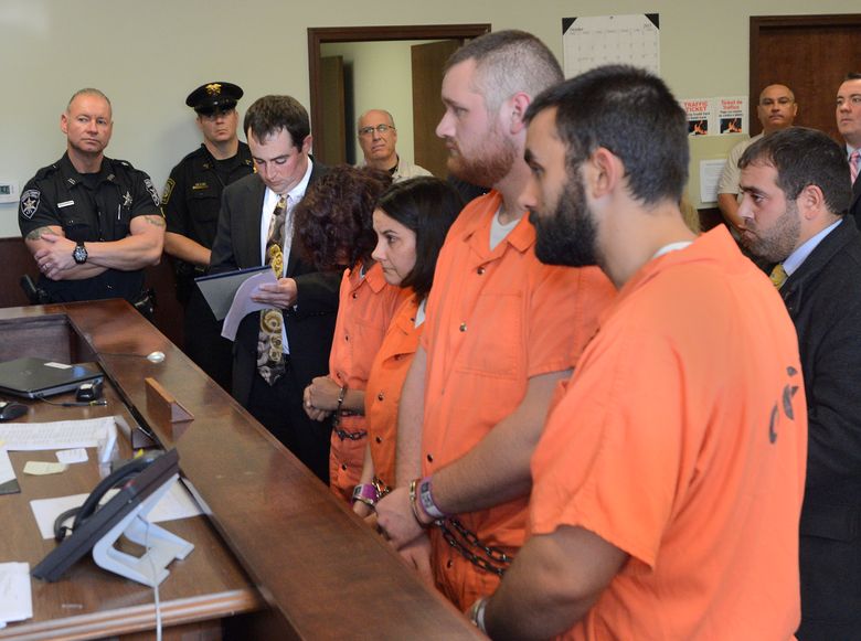 From left, Sarah Ferguson, 33, Linda Morey, 54, Joseph Irwin, 26, and David Morey, 26, are arraigned in front of Judge Bill M. Virkler after being charged with second-degree assault of 17-year-old Christopher T. Leonard, Teusday, Oct. 13, 2015 in New Hartford, N.Y. A central New York couple have been charged with fatally beating their 19-year-old son Lucas Leonard inside a church, and the four fellow church members have been charged with assault in an attack that also left the young man’s brother Christopher severely injured, police said Tuesday.  (Mark DiOrio/Observer-Dispatch via AP)  ROME OUT; MANDATORY CREDIT