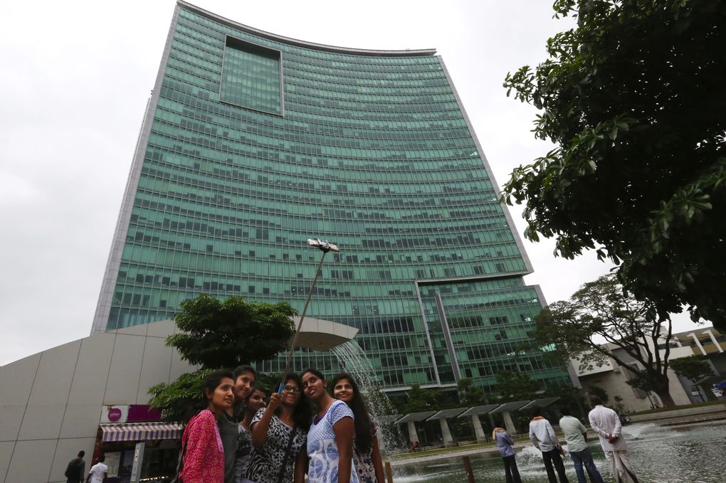 Amazon’s India headquarters in Bangalore occupies much of this high-rise in a gated development that includes a mall, residences and a school. (Alan Berner / The Seattle Times)