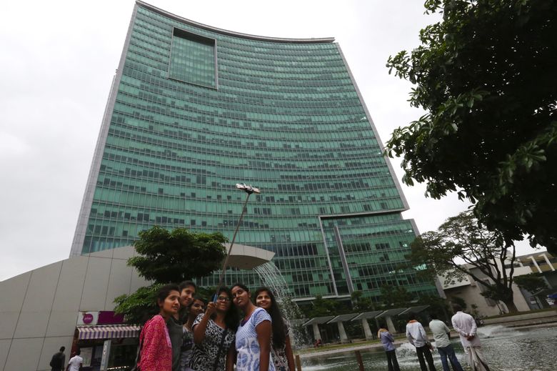 Amazon’s India headquarters in Bangalore occupies much of this high-rise in a gated development that includes a mall, residences and a school.  (Alan Berner / The Seattle Times)