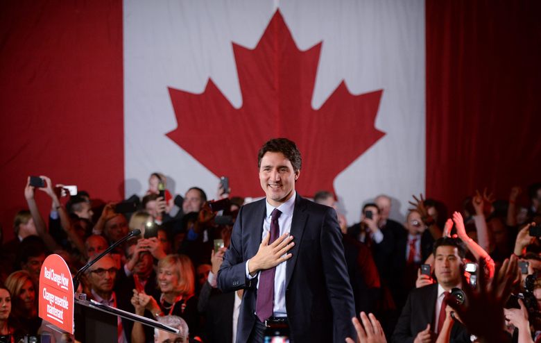 Liberal leader Justin Trudeau stands on stage at the Liberal party headquarters in Montreal, Tuesday, Oct. 20, 2015. Trudeau, the son of late Prime Minister Pierre Trudeau, became Canada’s new prime minister after beating Conservative Stephen Harper. (Sean Kilpatrick/The Canadian Press via AP) MANDATORY CREDIT
