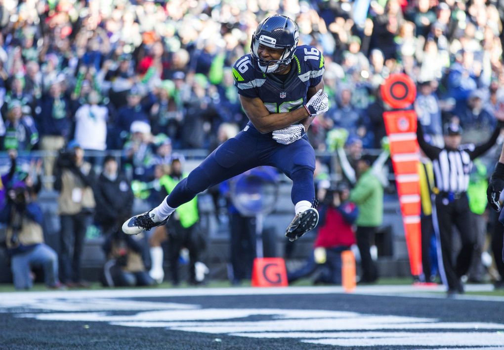 Seahawks wide receiver Tyler Lockett celebrates a touchdown in the second quarter. (Dean Rutz / The Seattle Times)