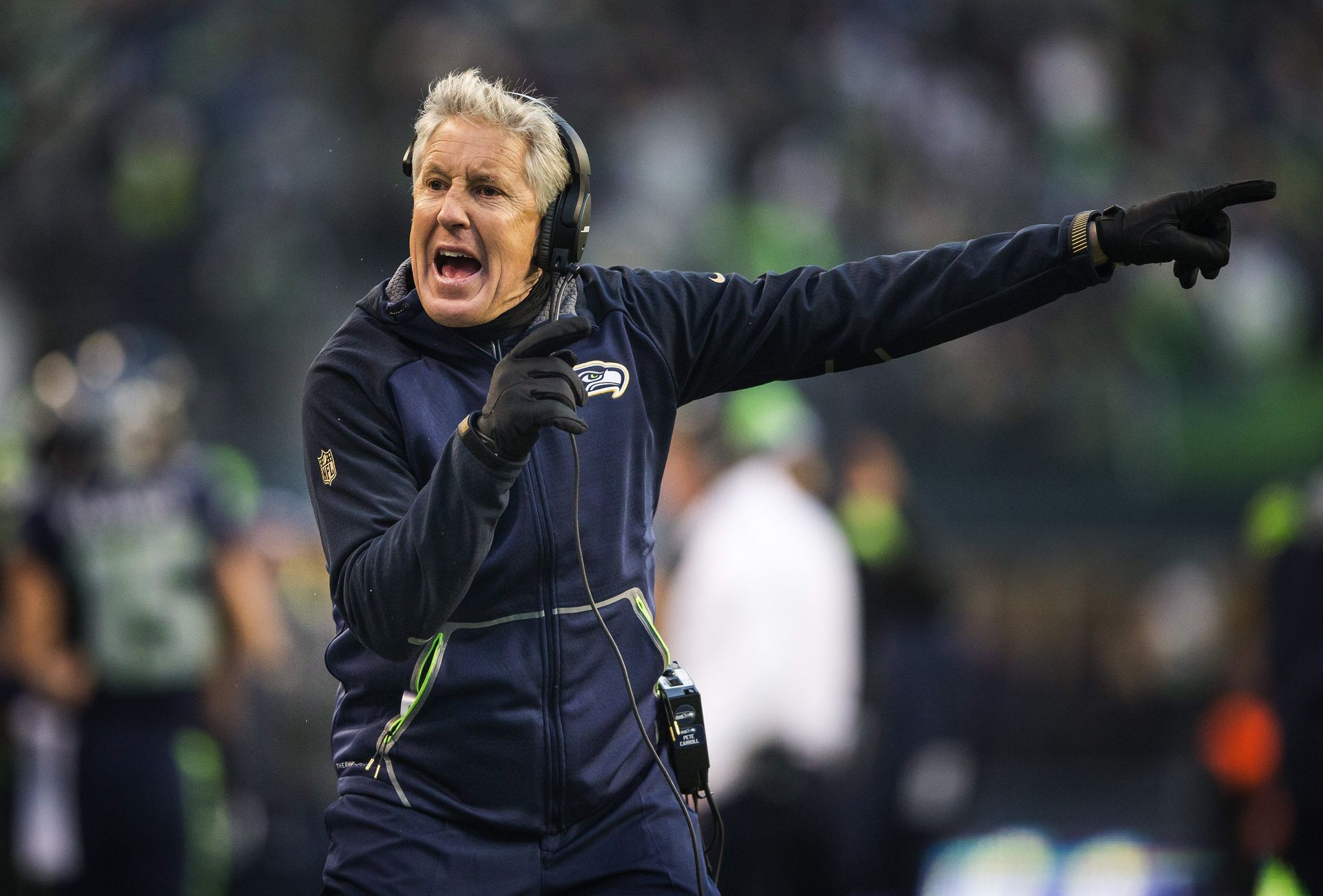 Seattle Seahawks head coach Pete Carroll gets ready to throw a