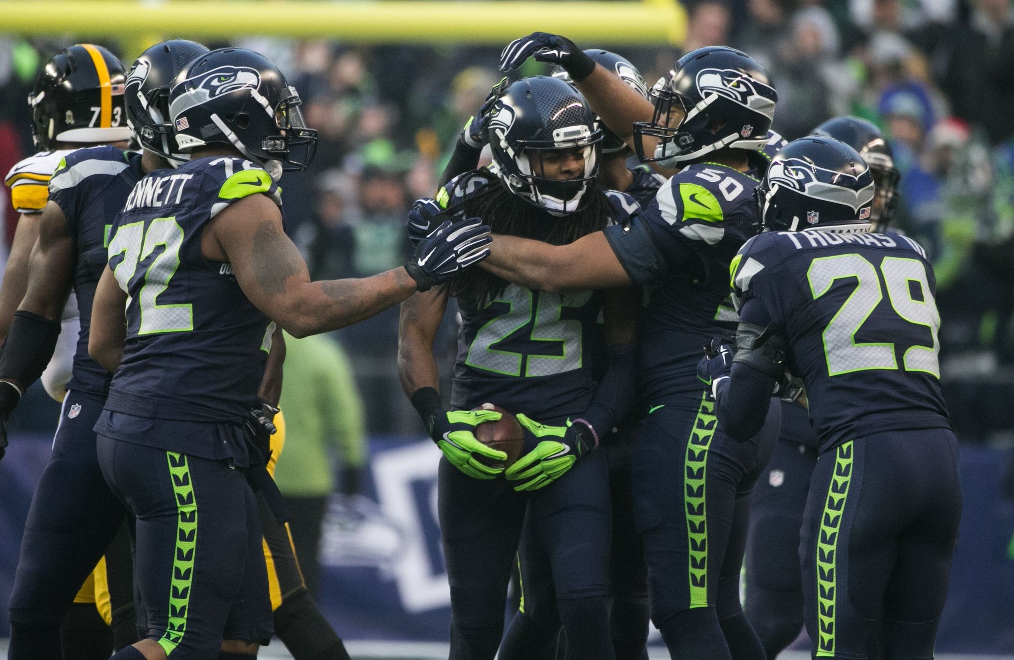 Seattle Seahawks including Thomas Rawls (34) and Cassius Marsh