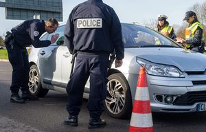 epa05024333 German and French police check a car coming from France at the French-German border crossing Goldene Bremm near Saarbruecken, Germany, 14 November 2015. The French government declared a state of emergency, tightened border controls and mobilized 1,500 soldiers in consequence to the 13 November Paris attacks. At least 120 people have been killed in a series of attacks in Paris on 13 November, according to French officials. Eight assailants were killed, seven when they detonated their explosive belts, and one when he was shot by officers, police said.  EPA/OLIVER DIETZE odi002